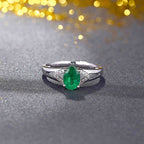 Solitaire Oval Emerald Ring with Trio Diamond Accents